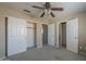 Bedroom featuring carpeted floors and closet at 823 W Bradford Dr, Gilbert, AZ 85233