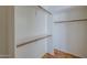 Spacious walk-in closet with built-in shelving and ample storage space at 823 W Bradford Dr, Gilbert, AZ 85233