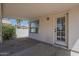 Covered patio with door into the home at 823 W Bradford Dr, Gilbert, AZ 85233