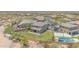 Aerial shot showing the home's large backyard with a pool, patio, and well-maintained landscaping at 9017 E June Cir, Mesa, AZ 85207