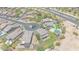 Stunning aerial view of luxury homes with pools in a meticulously planned desert community at 9017 E June Cir, Mesa, AZ 85207