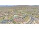Community aerial view featuring pools, basketball and tennis courts, green spaces and desert landscaped homes in the distance at 9017 E June Cir, Mesa, AZ 85207