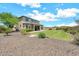 Expansive backyard featuring lush lawn and manicured landscaping at 9017 E June Cir, Mesa, AZ 85207