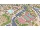 Aerial view of a well-maintained basketball court, tennis courts, and paved walking paths at 9017 E June Cir, Mesa, AZ 85207