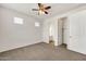 Bright bedroom with an ensuite bathroom and walk-in closet at 9017 E June Cir, Mesa, AZ 85207