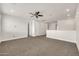 Bonus room featuring carpeted floor, and neutral paint, perfect for entertaining at 9017 E June Cir, Mesa, AZ 85207