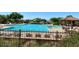 Relaxing community pool with plenty of seating options and beautiful desert landscaping, providing a resort-like experience at 9017 E June Cir, Mesa, AZ 85207