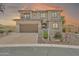 Charming two-story home with a well-manicured front yard at 9017 E June Cir, Mesa, AZ 85207