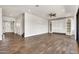 Spacious living room with tile floors and custom built-ins at 9017 E June Cir, Mesa, AZ 85207