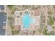 Aerial view of community pool and spa with cabanas and lounge chairs, surrounded by desert landscaping at 9017 E June Cir, Mesa, AZ 85207