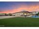 Spacious backyard with a pool and covered patio, ideal for relaxation and entertainment at 9445 W Monte Lindo --, Peoria, AZ 85383