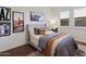 Bedroom featuring a bed, side tables, decor, and a sunny window at 9445 W Monte Lindo --, Peoria, AZ 85383