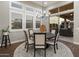 Breakfast nook features a round table, neutral chairs, and views to the outside patio at 9445 W Monte Lindo --, Peoria, AZ 85383