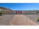 Paver driveway leading to a private driveway gate, adding security and charm to the property at 9445 W Monte Lindo --, Peoria, AZ 85383