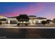 Attractive single-story home featuring a stylish stone facade and three-car garage at 9445 W Monte Lindo --, Peoria, AZ 85383