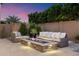 Cozy outdoor fire pit area with comfortable seating, perfect for gathering with friends and Gathering at 9445 W Monte Lindo --, Peoria, AZ 85383