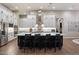 Spacious open kitchen with stainless steel appliances and a large center island with barstool seating at 9445 W Monte Lindo --, Peoria, AZ 85383