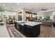Open concept kitchen with a large island and stainless steel appliances overlooking the living room at 9445 W Monte Lindo --, Peoria, AZ 85383