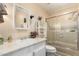 Bathroom featuring a shower-tub combo with sliding glass doors and a vanity sink at 9501 E Broadway Rd # 168, Mesa, AZ 85208