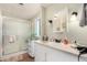 Bathroom with a shower, sink and vanity in a modern setting at 9501 E Broadway Rd # 168, Mesa, AZ 85208