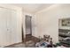 Bedroom featuring a closet, ample storage, and a comfortable seating area at 9501 E Broadway Rd # 168, Mesa, AZ 85208