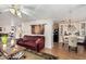Comfortable living room with laminate flooring, dining area, and modern decor at 9501 E Broadway Rd # 168, Mesa, AZ 85208