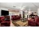 Spacious living room with cozy seating, stylish décor, and ample natural light at 9501 E Broadway Rd # 168, Mesa, AZ 85208