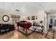 Versatile living space with piano, workspace, and stylish interior design elements at 9501 E Broadway Rd # 168, Mesa, AZ 85208