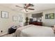 Comfortable bedroom featuring a television, dresser, and natural light at 9501 E Broadway Rd # 168, Mesa, AZ 85208