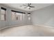 Bright and spacious bedroom with multiple windows allowing plenty of natural light at 10261 W Foothill Dr, Peoria, AZ 85383