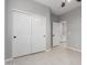 Bedroom with a large closet and an entry to the bathroom at 10261 W Foothill Dr, Peoria, AZ 85383