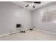 Spare bedroom with a ceiling fan, and electrical access point on the wall at 10261 W Foothill Dr, Peoria, AZ 85383