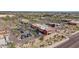 Overhead shot captures a commercial building, parking, and nearby businesses, illustrating the area's retail and service offerings at 10261 W Foothill Dr, Peoria, AZ 85383