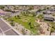 Well-maintained neighborhood park with grassy areas, mature trees, and walking trails at 10261 W Foothill Dr, Peoria, AZ 85383