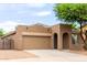 Exterior view featuring a neatly maintained front yard with desert landscaping at 10261 W Foothill Dr, Peoria, AZ 85383