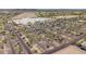 Aerial shot captures the vast parking lot filled with cars and trees, adjacent to a large shopping complex in a bustling area at 10261 W Foothill Dr, Peoria, AZ 85383