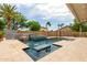 Resort style backyard features a pristine pool, spa, and water features at 10261 W Foothill Dr, Peoria, AZ 85383