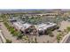Aerial shot of a restaurant featuring outdoor seating, a well-maintained parking lot, and desert landscaping on a sunny day at 10261 W Foothill Dr, Peoria, AZ 85383