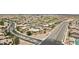 An aerial view of a Sunland Springs neighborhood showcases the well-maintained landscaping and residential street layout at 11320 E Newcastle Ave, Mesa, AZ 85209