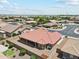 An elevated view of home's landscaped yard, covered patio, and neighborhood layout at 11320 E Newcastle Ave, Mesa, AZ 85209