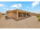 Inviting backyard features a covered patio, perfect for outdoor entertaining and relaxation at 11320 E Newcastle Ave, Mesa, AZ 85209