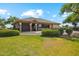 Clubhouse surrounded by meticulously manicured landscaping and mature trees at 11320 E Newcastle Ave, Mesa, AZ 85209