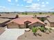 Beautiful single-story home featuring a three car garage, low maintenance landscaping, and a tile roof at 11320 E Newcastle Ave, Mesa, AZ 85209
