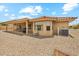 The exterior showcases an extended patio and a convenient outdoor water spigot at 11320 E Newcastle Ave, Mesa, AZ 85209