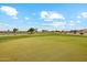 The Sunland Springs golf course has beautiful green grass and a water feature for a challenging game at 11320 E Newcastle Ave, Mesa, AZ 85209