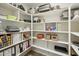Spacious walk-in pantry with abundant shelving to keep all of your cooking and baking items organized at 11320 E Newcastle Ave, Mesa, AZ 85209