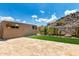 Fenced yard with storage building and desert landscape at 14058 S 24Th Way, Phoenix, AZ 85048