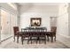 Elegant dining room with a large table, stylish chairs, and an ornate area rug at 14058 S 24Th Way, Phoenix, AZ 85048