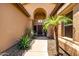Inviting front entrance with desert landscaping, large windows and a beautiful wood door at 14058 S 24Th Way, Phoenix, AZ 85048