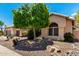 Charming desert home with mature shade tree, drought resistant landscaping and tile roof at 14058 S 24Th Way, Phoenix, AZ 85048